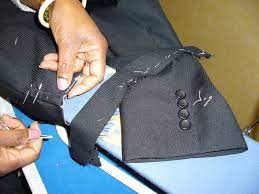 Ourlet manche veste costume