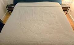 Couvre lit synthetique