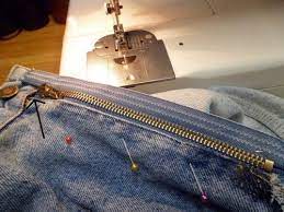 Pose fermeture sur pantalon